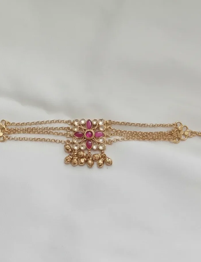 Traditional Kundan & Gold-Toned Bracelet with Hanging Beads